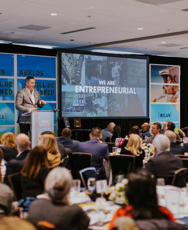 Speaker at a large group meeting