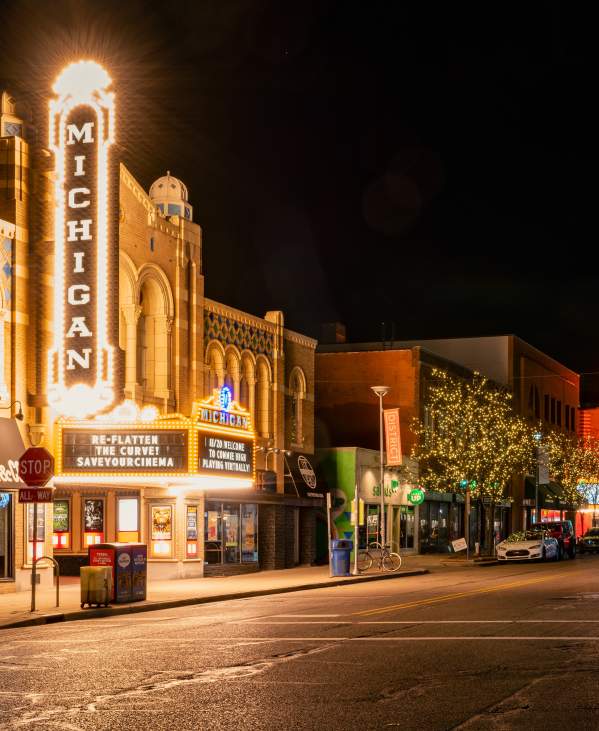 Lights on marquee of Michigan Theater at night