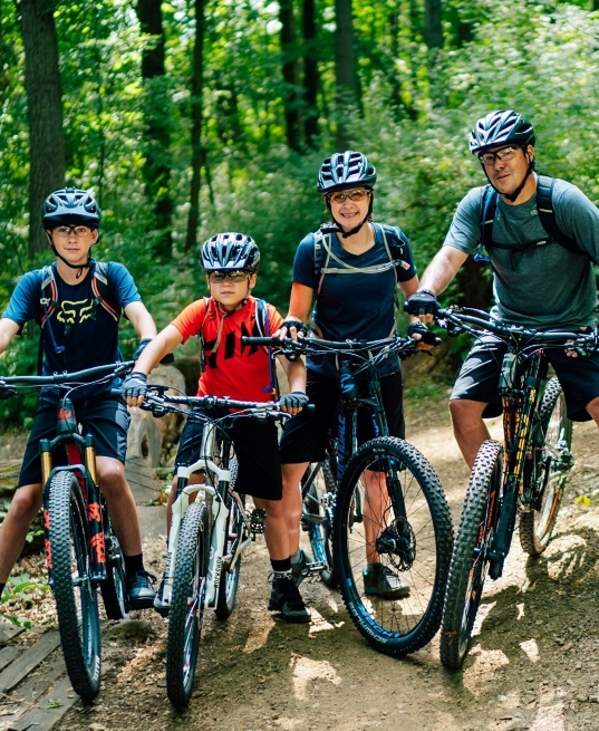 Family biking the DTE Energy Foundation Trail