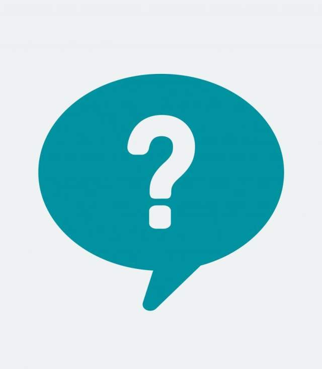 A teal speech bubble with question mark