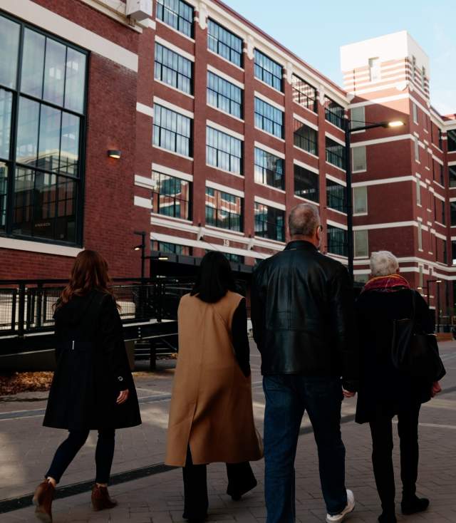 Friends standing outside Electric Works
