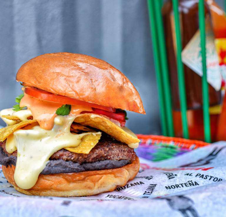 Loaded hamburger with melted cheese