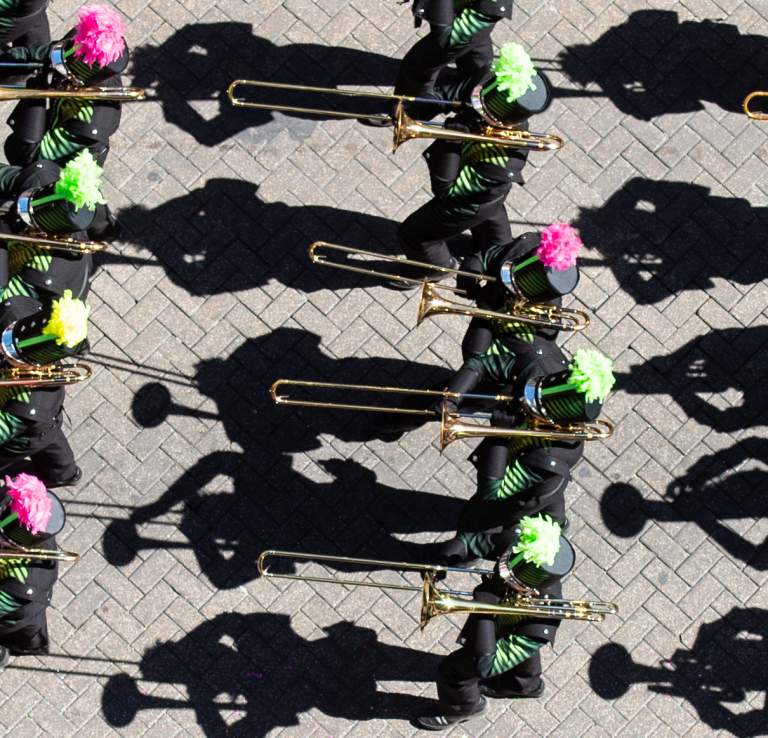 Overhead view of marching band in Battle of Flowers Parade at Fiesta