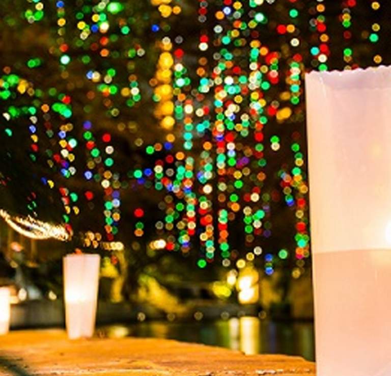 Bag with light and holiday lights in background