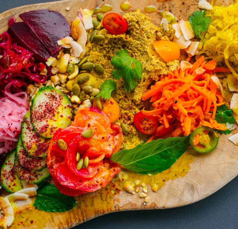Overhead view of different foods on cutting board