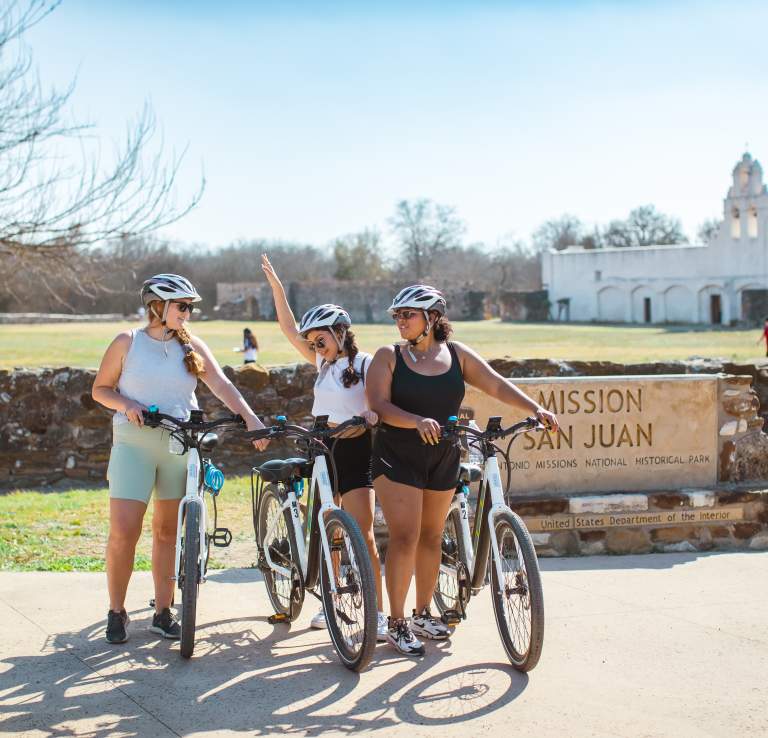 3 Friends with Bikes in front of Mission San Jose