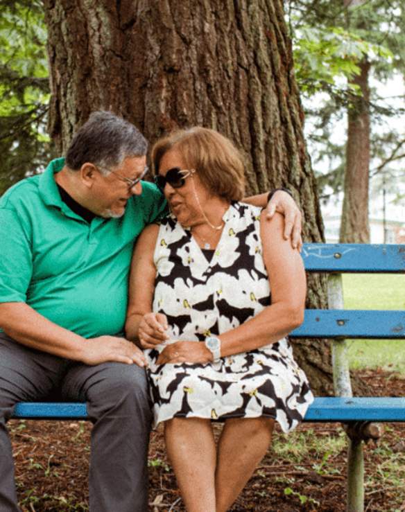 elderly couple on a park bench