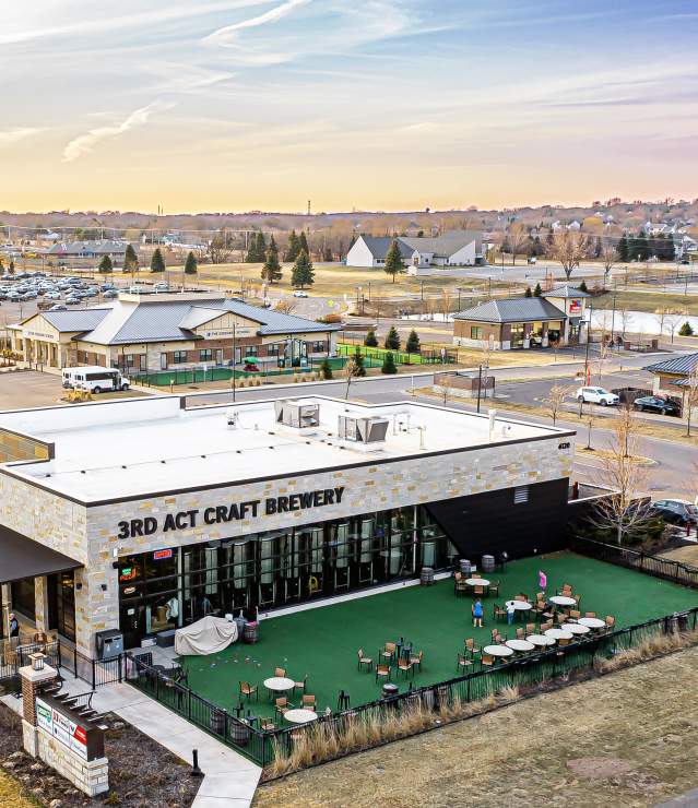 Aerial of brewery and other local businesses