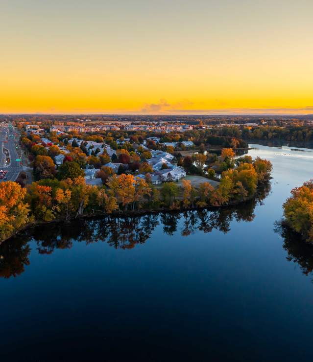 Aerial photo of a lake at sunrise