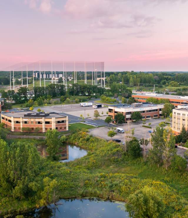 Aerial photo of Topgolf structure and hotels and local businesses in Woodbury.