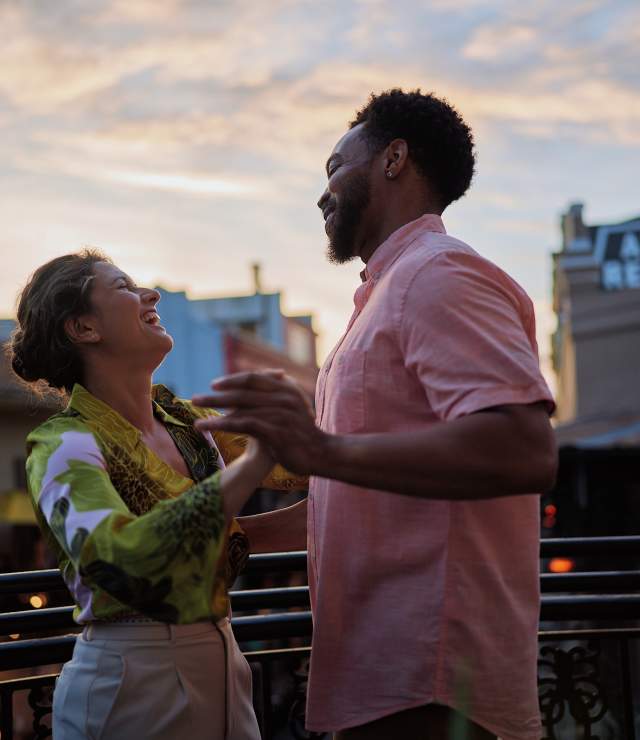 Couple Dancing on French Quarter Balcony