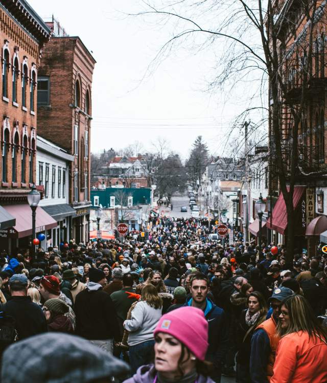 Crowd roaming the streets of downtown saratoga