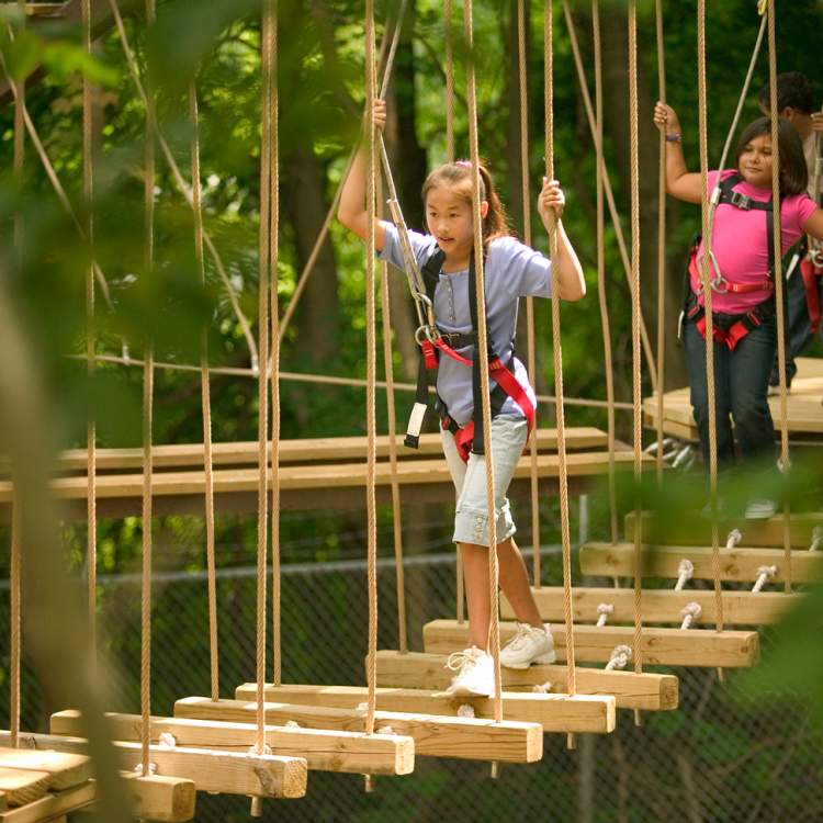 Kids love all the activities at John Ball Zoo including the ropes course.