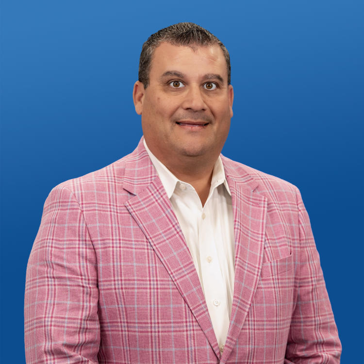 Headshot of Visit Orlando Board Member Chris Mueller