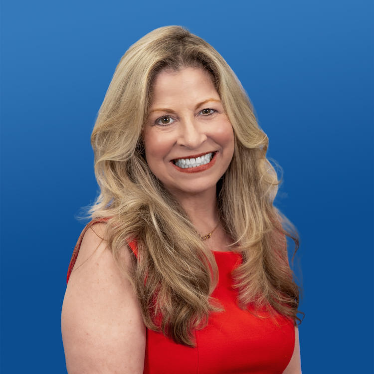 Headshot of Visit Orlando Board Member Maria Triscari