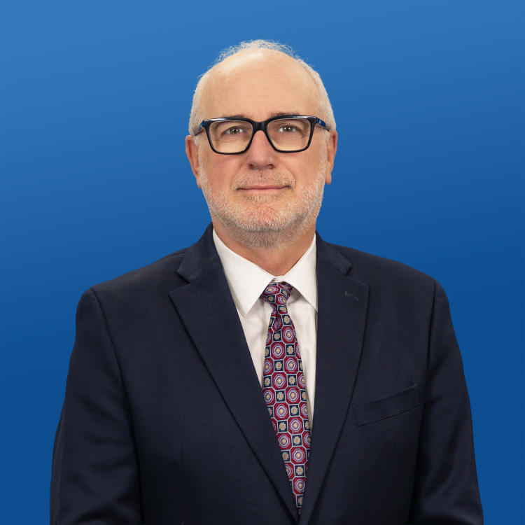 Headshot of Visit Orlando Board General Counsel William "Bill" Dymond Jr