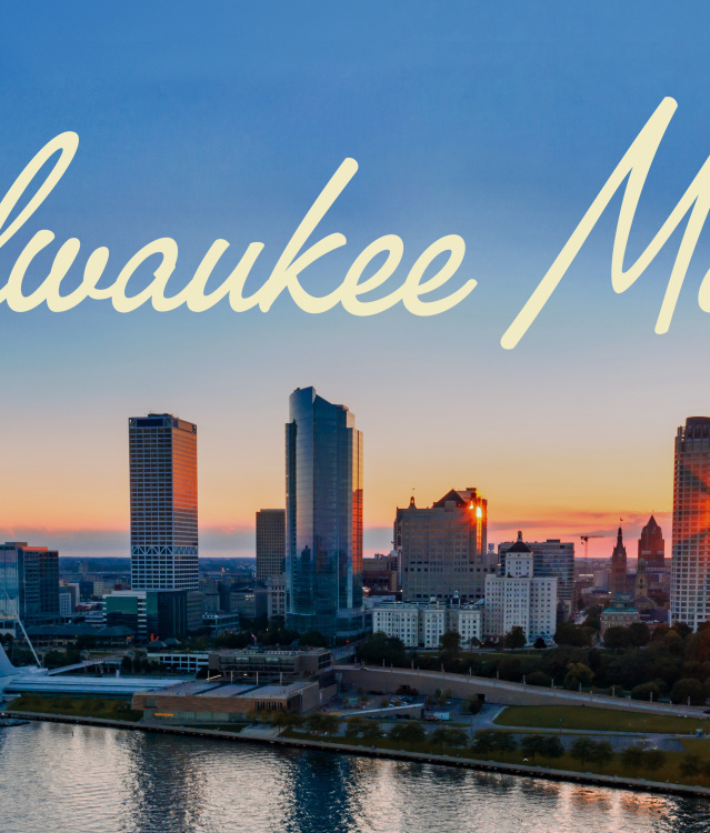 Milwaukee skyline at sunset with the words Milwaukee Made in script over the top