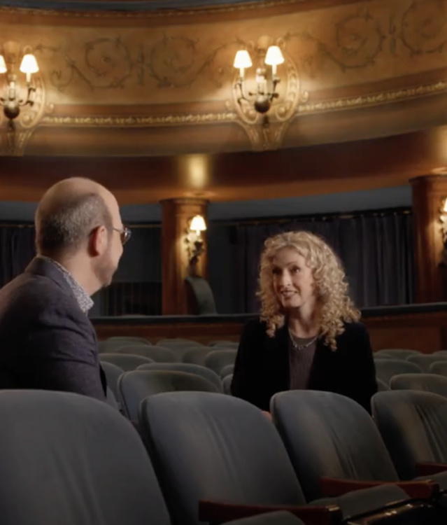 David Caruso and Susan Varela sit and converse in the plush seating of the ornate, dimly lit Cabot Theatre.