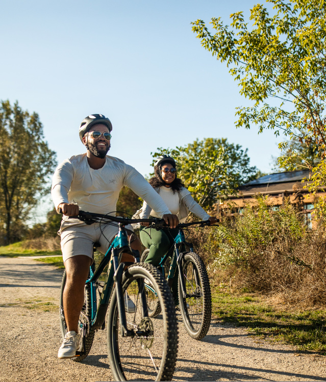 two people biking in Havenwoods State Park