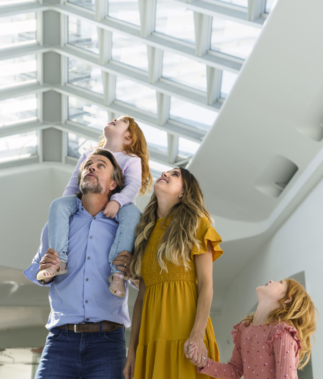 Familes looking around the Milwaukee Art Museum