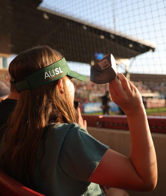 A close up of a woman's AUSL visor