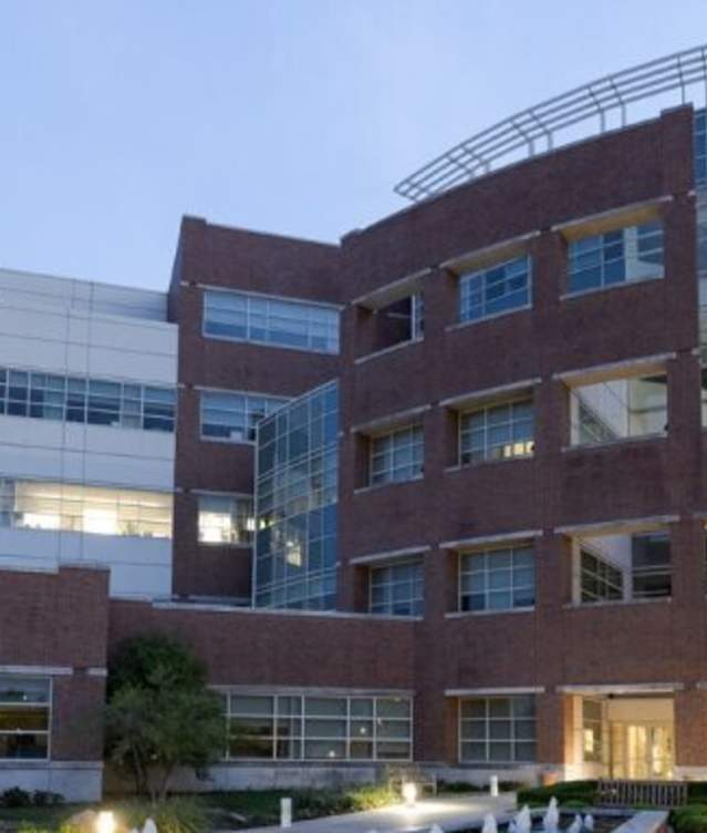 The front of the national weather center at dusk