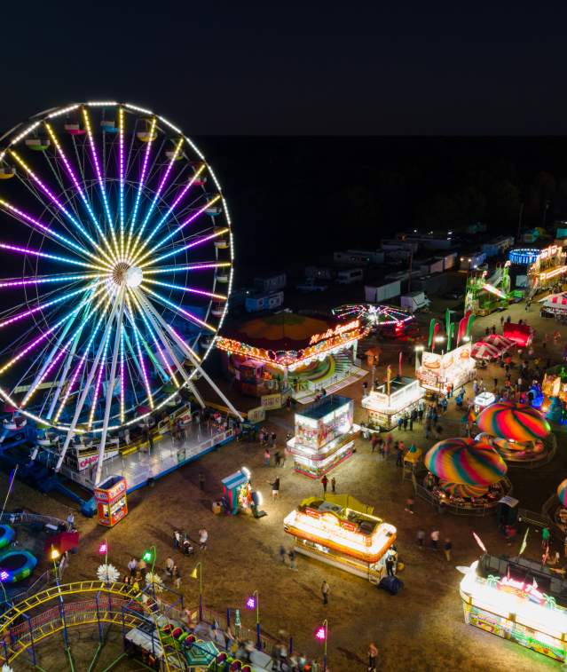 ferris wheel at night lit up