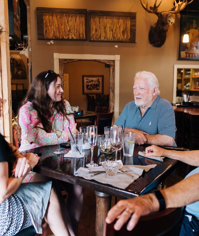Four people dining together