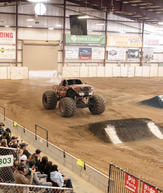 monster truck about to jump a ramp