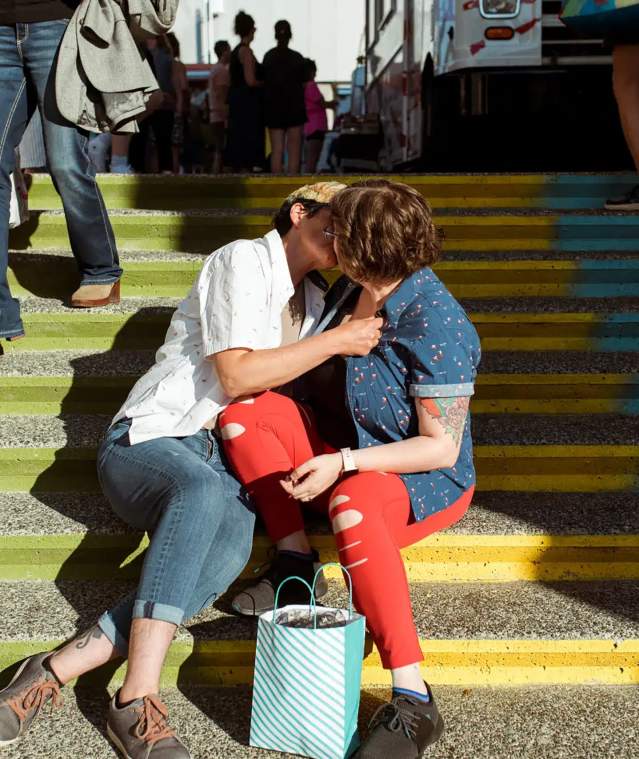 couple kissing on steps