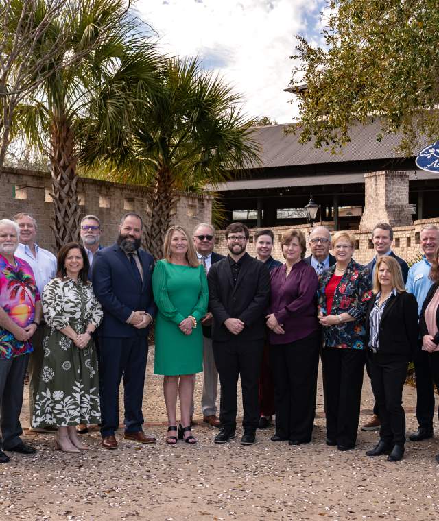 Picture of Destination NMB Board of Directors standing in a semi-circle