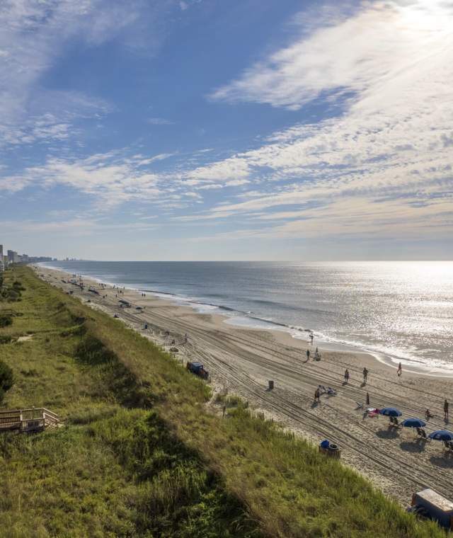 North Myrtle Beach Shoreline, with an oceanfront resort, early in the morning.