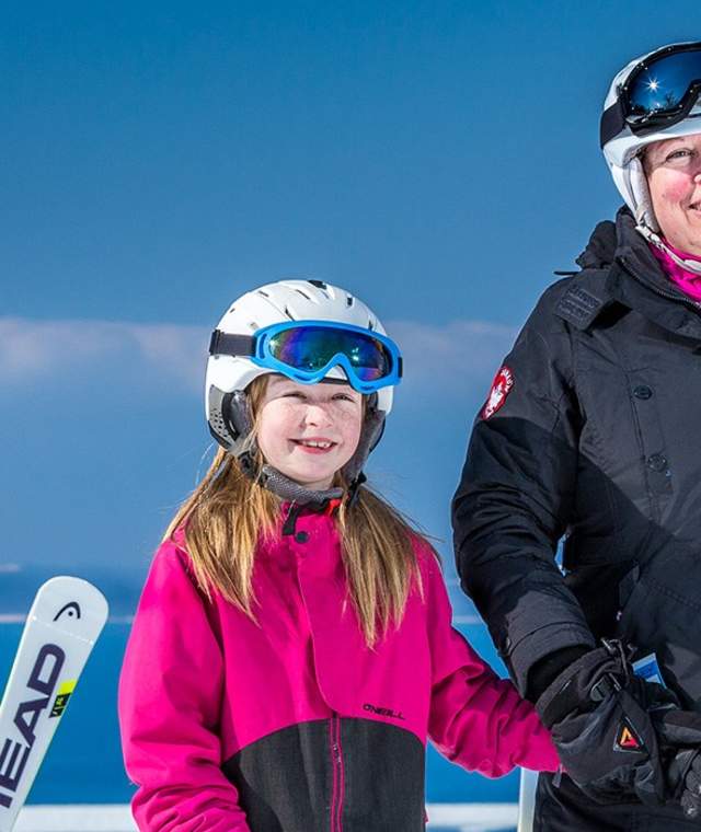 Mother & Daughter in ski gear