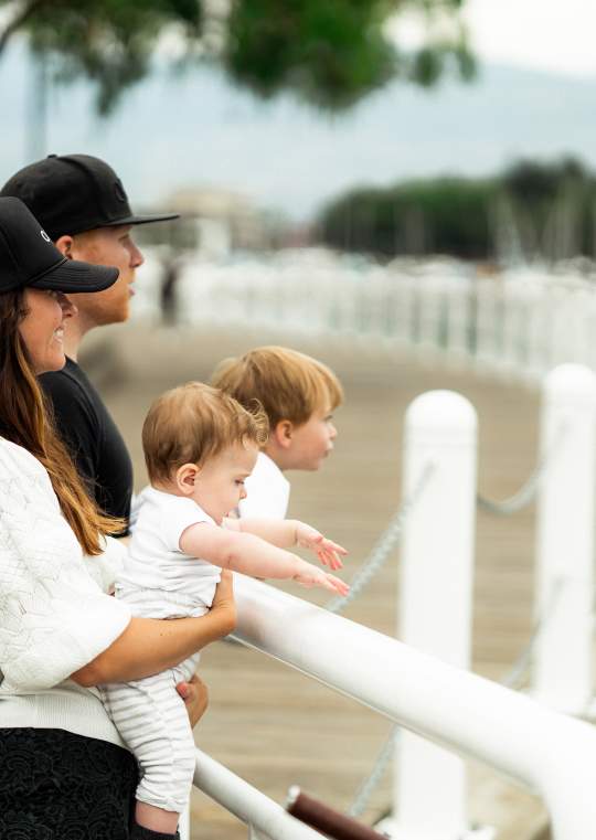 Family at Waterfront Boardwalk