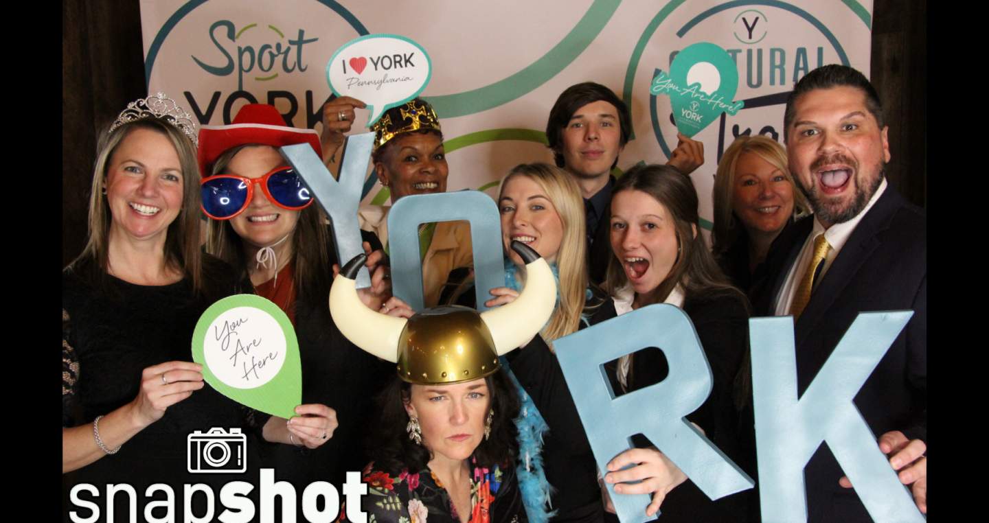 EY staff at ATIE photobooth