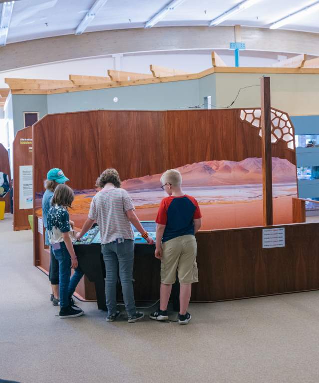 Family and child at an Science Zone exhibit in Casper, WY