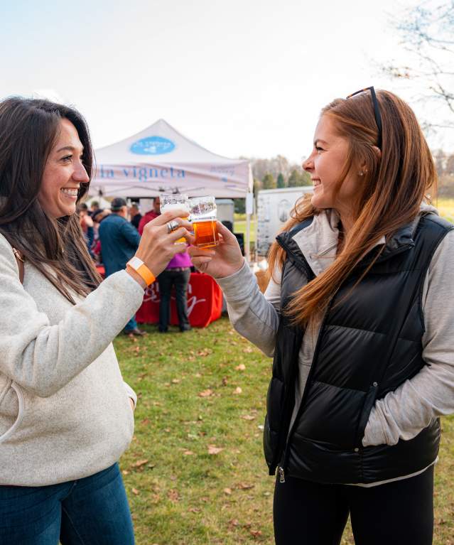 People raise a glass to Bonfires, Barrels & Brews