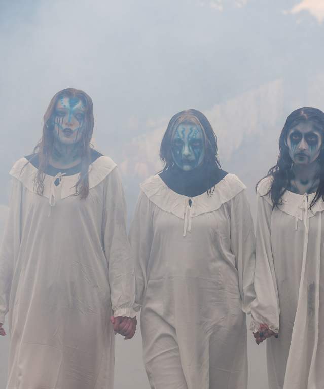 Ghost choir singing and walking through fog at Fright Fest