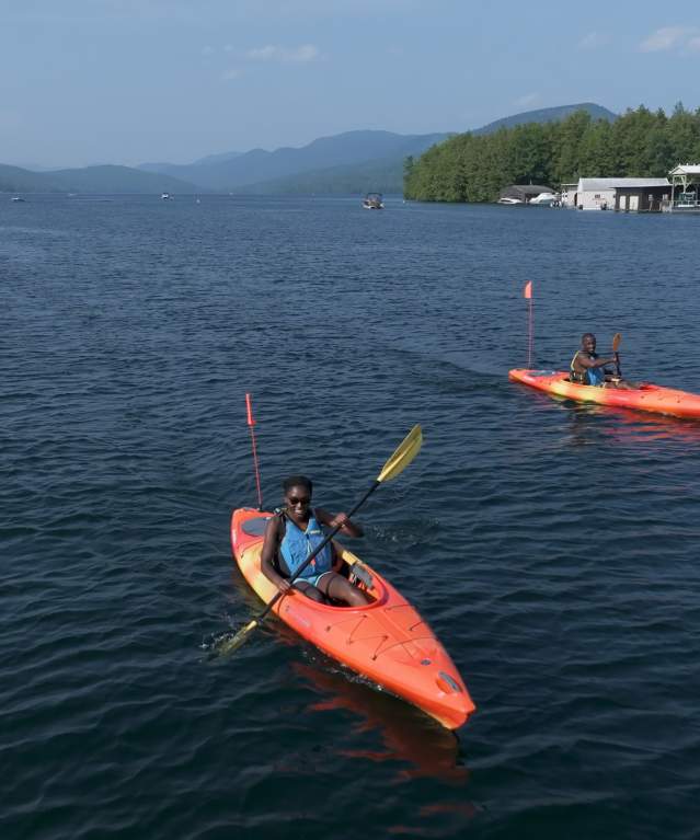 Aerial shot of a couple kayaking on Lake George