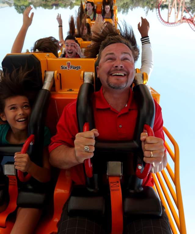 Family Riding a Roller Coaster