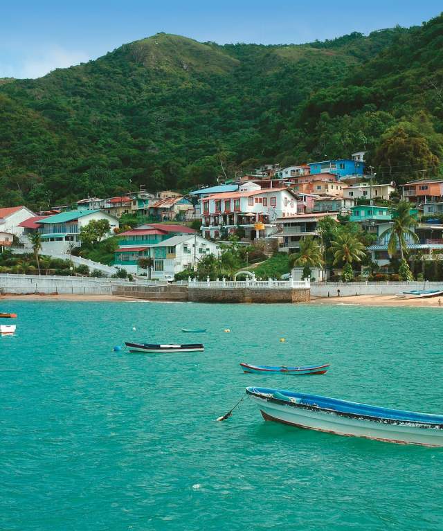 Beautiful view of Taboga Island town and beach in a sunny day