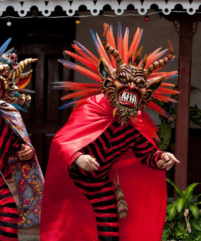 People dressed with diablicos traditional costume and Devil mask