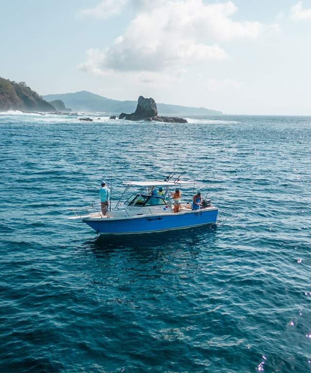 Beautiful blue sea with boat sailing in the Gulf of Montijo in Veraguas
