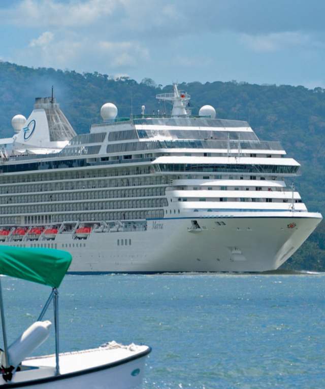 Tourists sailing through the Panama Canal on a clear day, Panama City