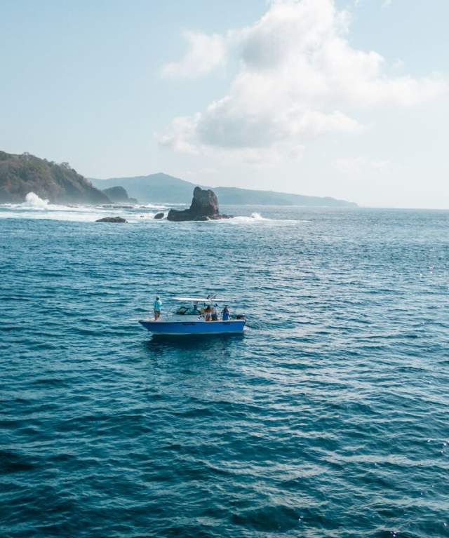 Beautiful blue sea with boat sailing in the Gulf of Montijo in Veraguas