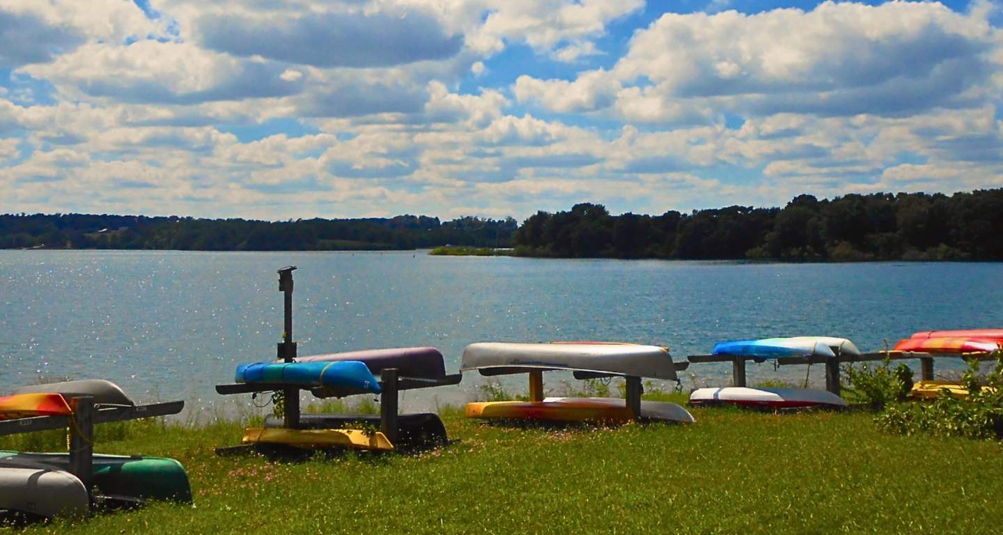 kayaks and canoes lined up at codorus state park