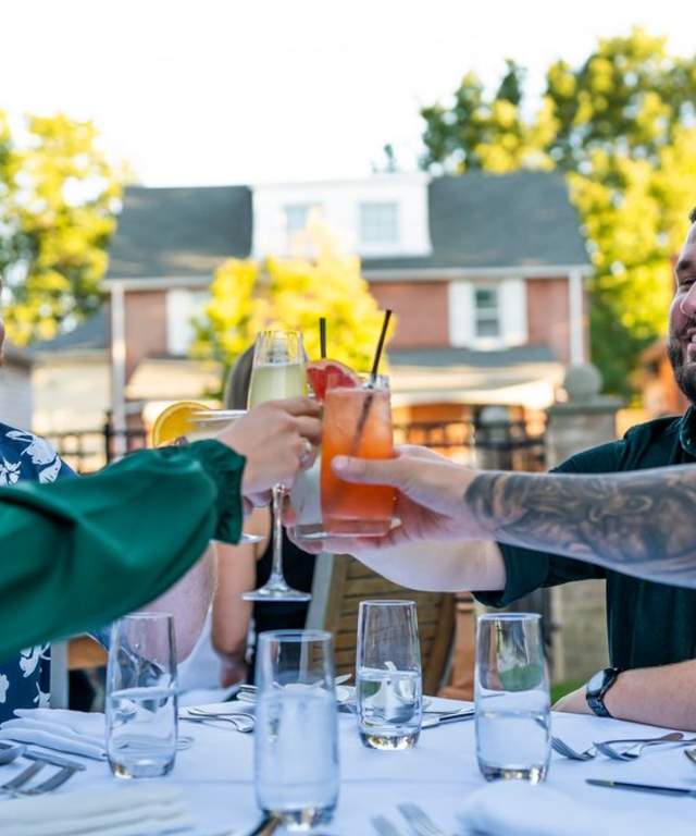 friends cheering with drinks