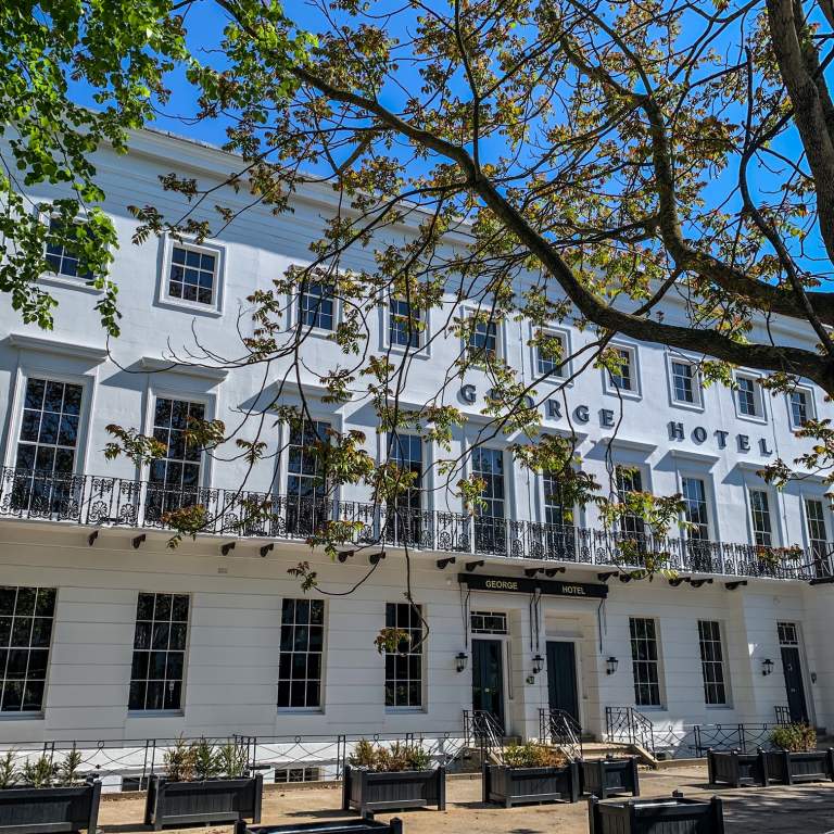 Exterior view of the George Hotel in Cheltenham