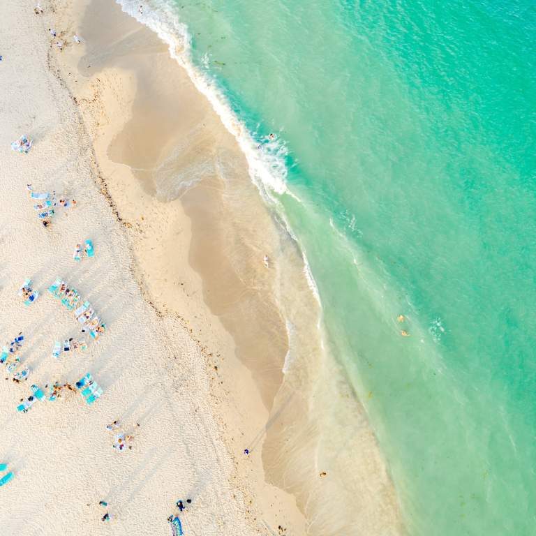 Overhead View Of People At Hollywood Beach In Fort Lauderdale, FL