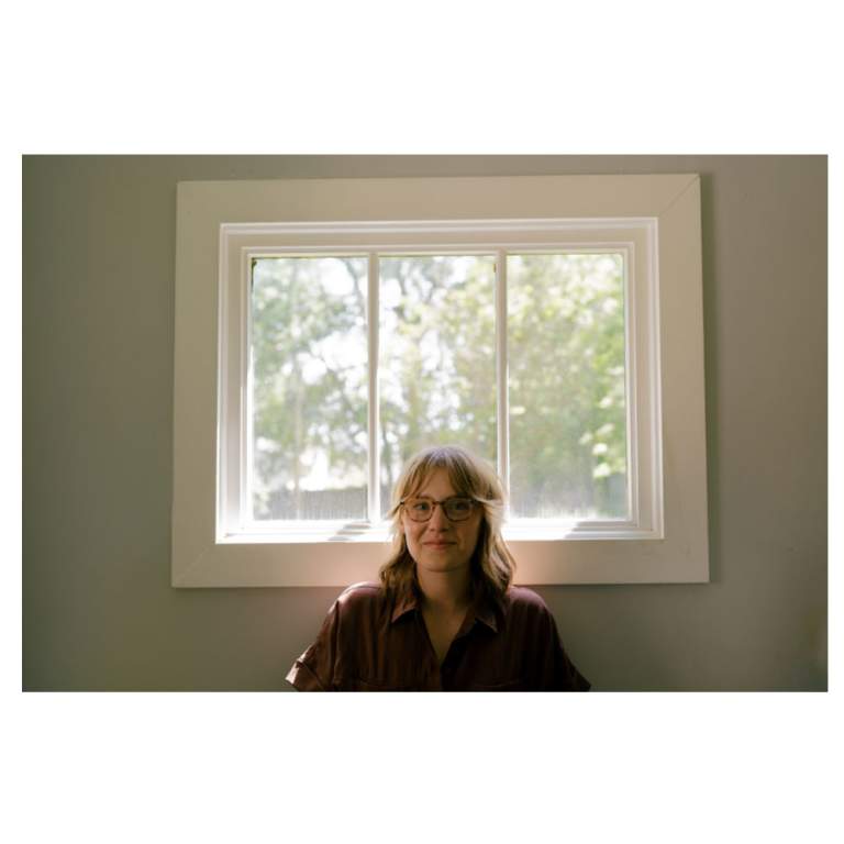 Addison Agen smiling at camera.